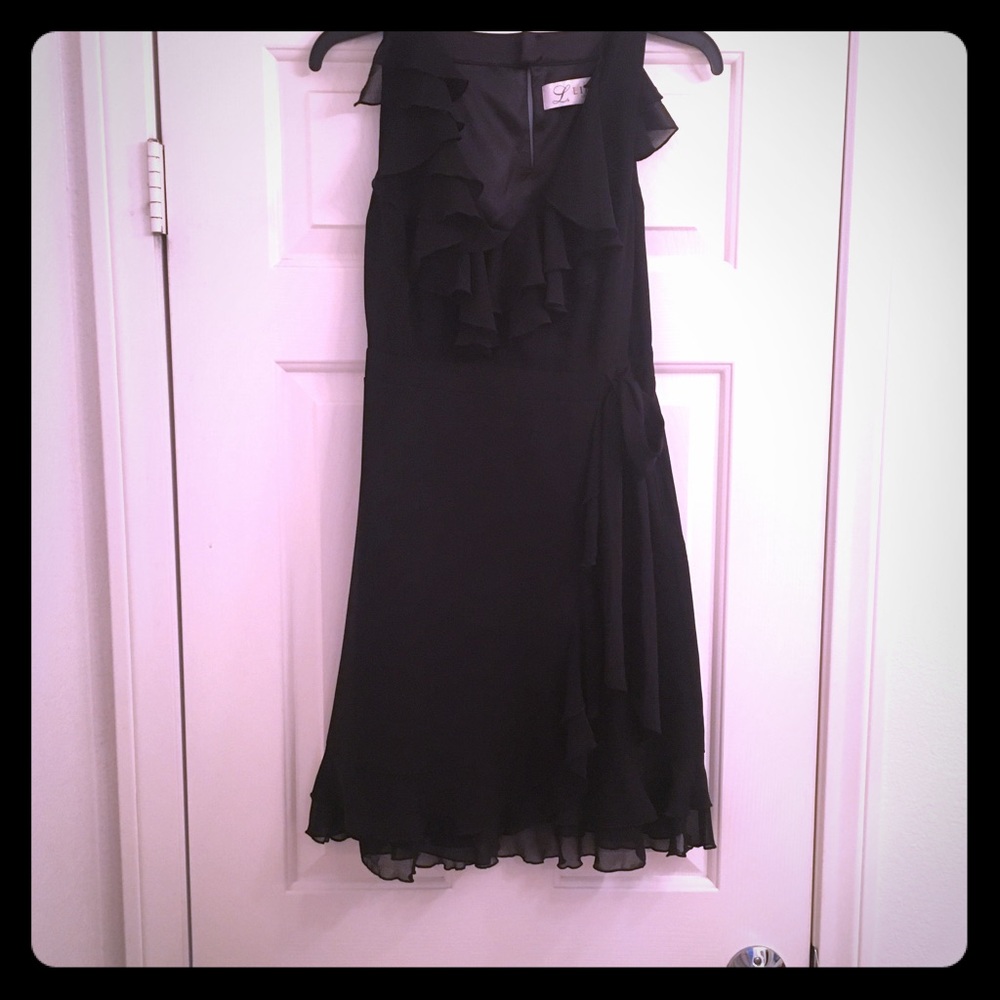 Mini black dress with ruffles